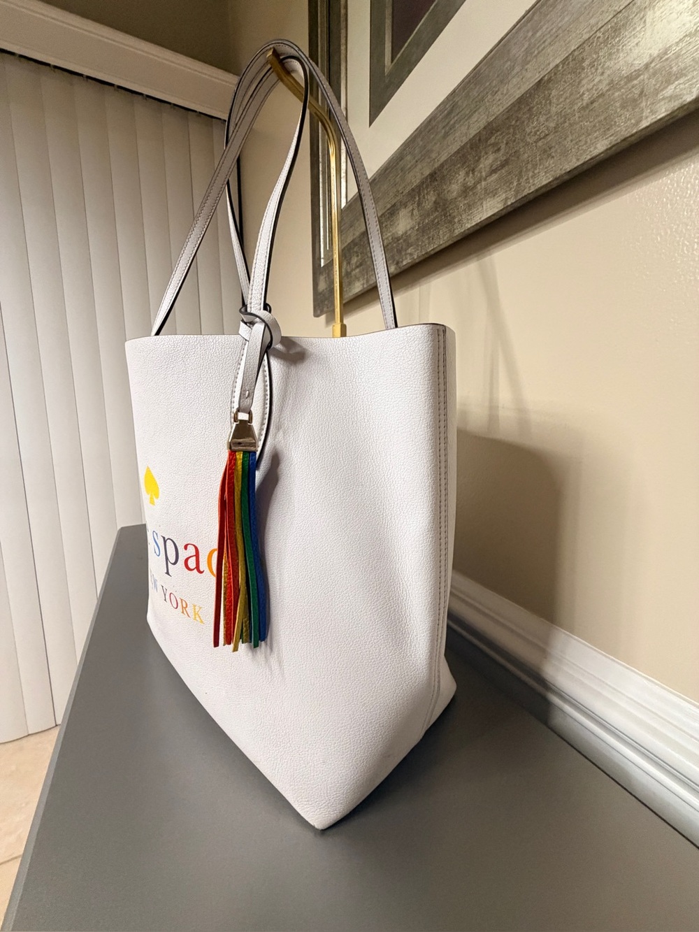 Kate Spade Reversible White Tote with Rainbow Tassel - Picture 5 of 7